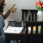 person working on laptop in home office